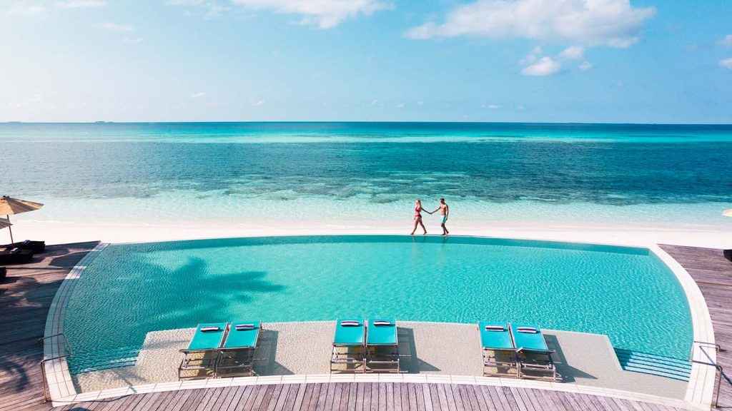 Luxury at Kuredu Maldives Resort & Spa – Your Gateway to Paradise From £2058.60pp 44 KUR couple pool 1600x900 Louise and Scott at Hays Travel