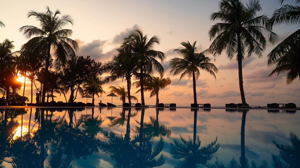 Luxury at Kuredu Maldives Resort & Spa – Your Gateway to Paradise From £2058.60pp 48 Kuredu main pool sunrise 1600x900 Louise and Scott at Hays Travel