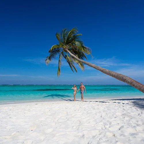 MeeruBeachwithModels2 500x500 1 Louise and Scott at Hays Travel