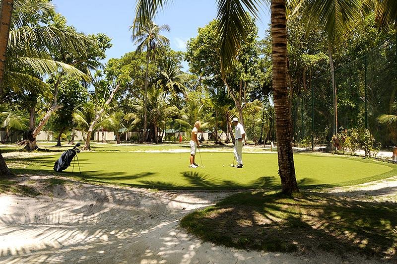 meeru golf pitch and Louise and Scott at Hays Travel